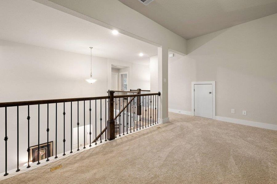 Expansive game room ideal for movie nights, play space, or a second living/recreational area.