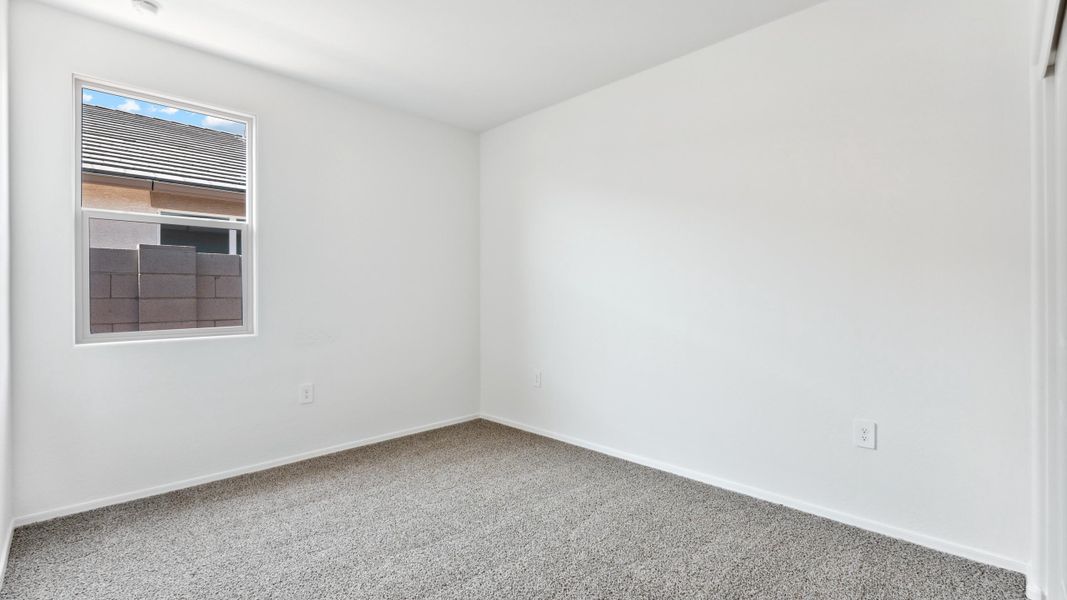 Spacious, unfurnished interior of a new home in Quail Ranch, San Tan Valley (Image 21).