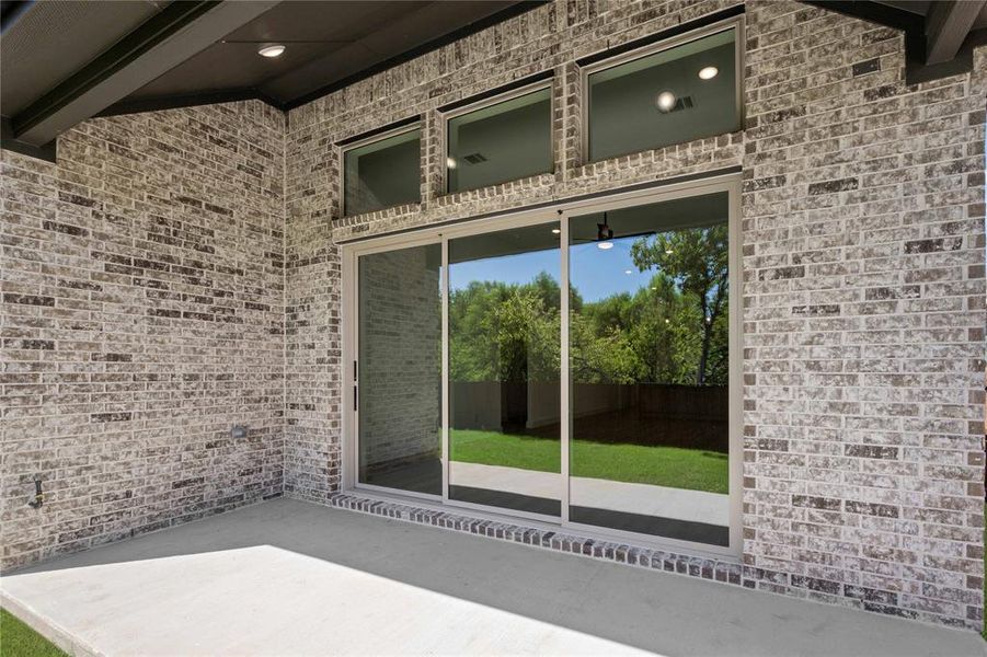 Exterior details and patio area of a home in Birdsong, Mansfield (Image 2).