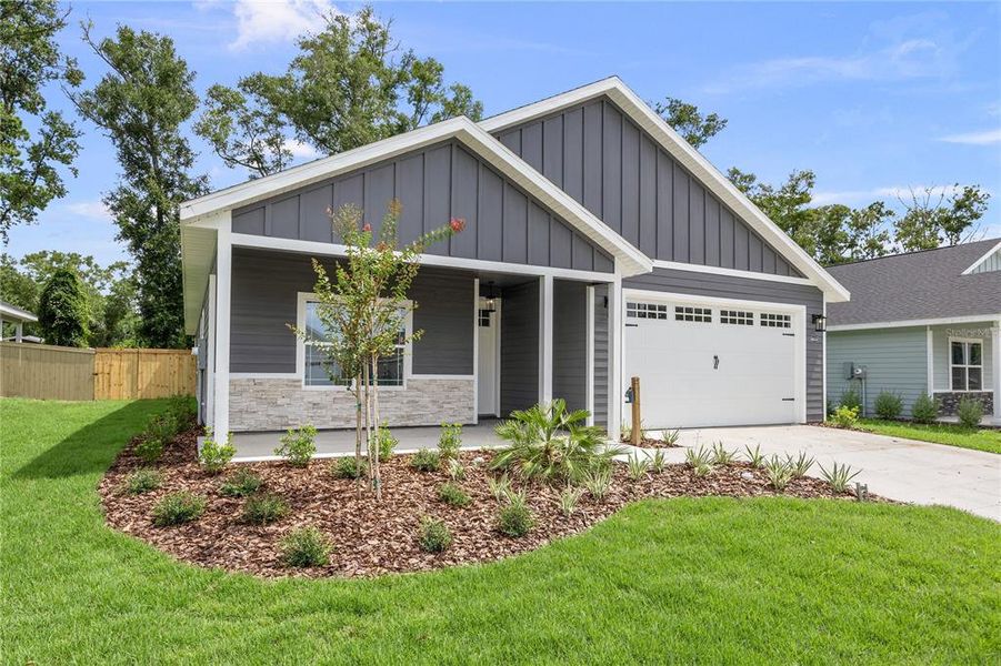 Front exterior of a new home in , Gainesville, FL, highlighting curb appeal (Image 15).