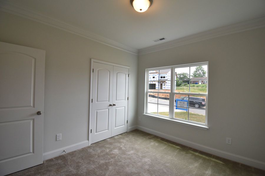 Representative unfurnished interior of a home built from the Ellerbe by Keystone Homes NC in Sullivans Reserve, Walkertown (Image 23).