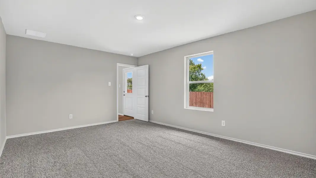 Spacious, unfurnished interior of a new home in Monarch at the Meadows, Ponder (Image 14).