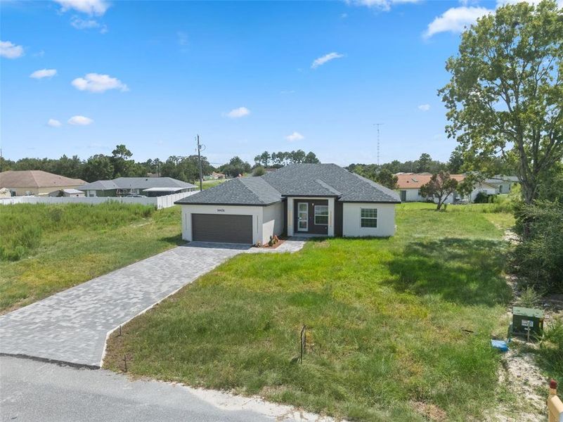 Front exterior of a new home in , Ocala, FL, highlighting curb appeal (Image 1). Front exterior of a new home in , Ocala, FL, highlighting curb appeal (Image 1).