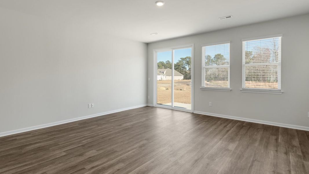 Representative unfurnished interior of a home built from the TILLMAN by D.R. Horton in Surfside Landing, Hubert (Image 31).