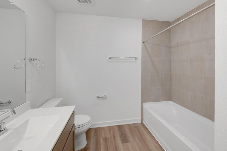 Furnished interior view inside a new home in Lone Star Landing, Montgomery (Image 12).