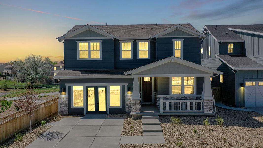 Front exterior of a new home in Arras Park, Thornton, CO, highlighting curb appeal (Image 2).