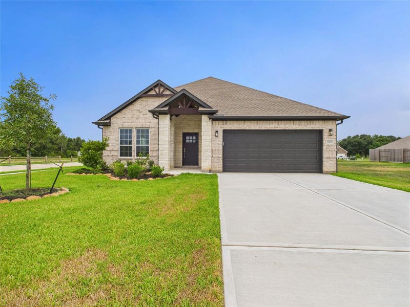 Front exterior of a new home in , Santa Fe, TX, highlighting curb appeal (Image 1). Front exterior of a new home in , Santa Fe, TX, highlighting curb appeal (Image 1).