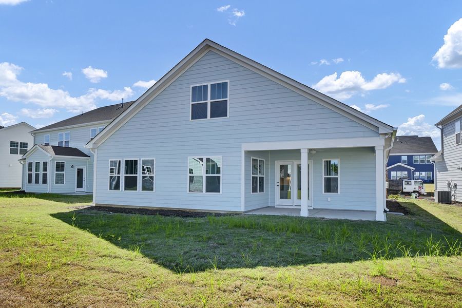 Exterior details and patio area of a home in Grand Park, Leland (Image 3).