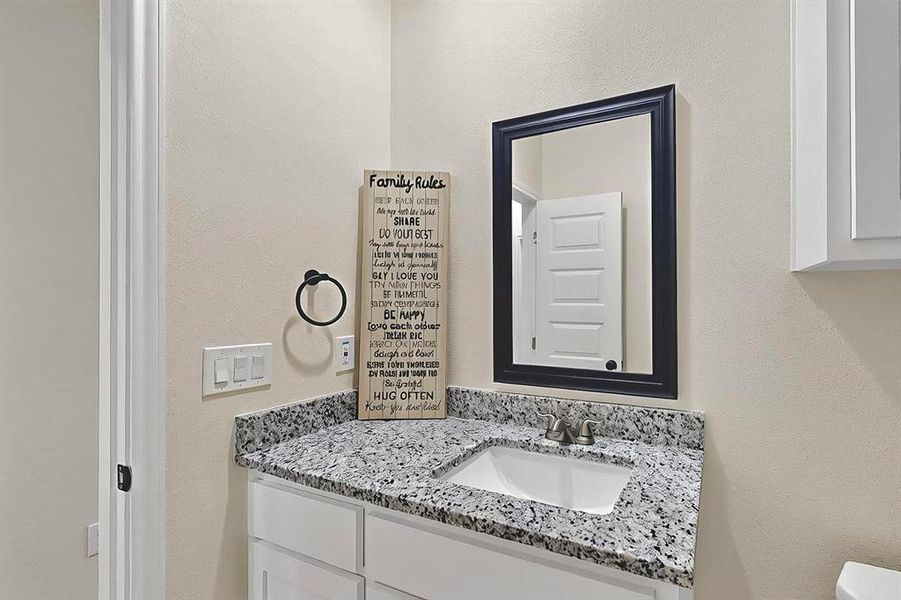 Bathroom featuring vanity Bathroom featuring vanity