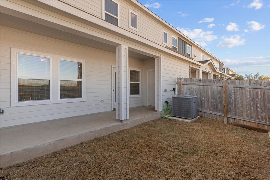 Fenced backyard with a patio - alt view Fenced backyard with a patio - alt view