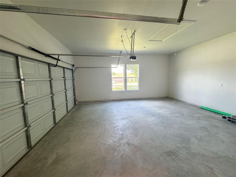 Garage with a garage door opener Garage with a garage door opener