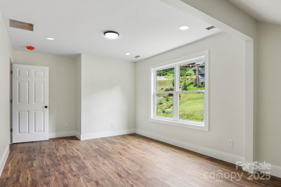 Spacious, unfurnished interior of a new home in , Waynesville (Image 25).