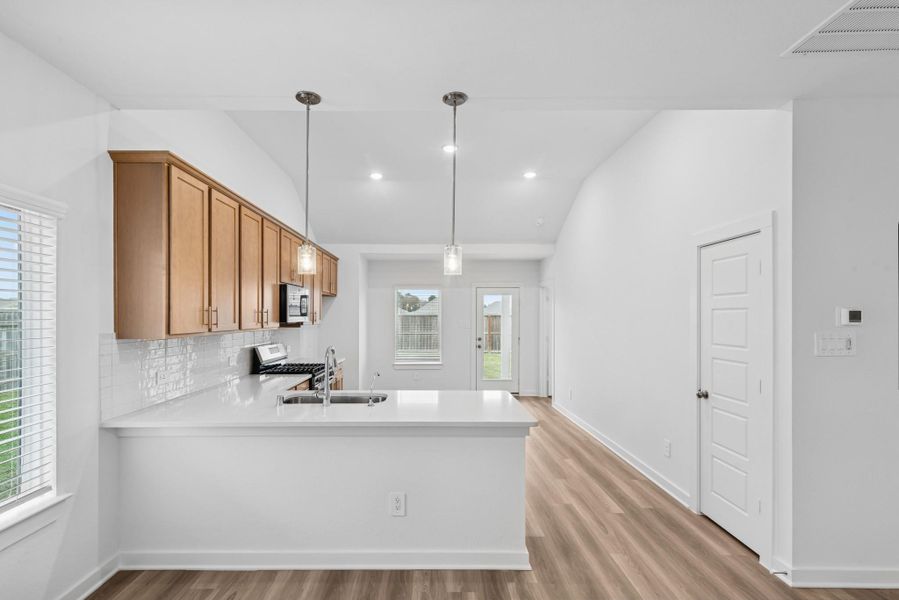 Furnished interior view inside a new home in Pinewood at Grand Texas, New Caney (Image 6).