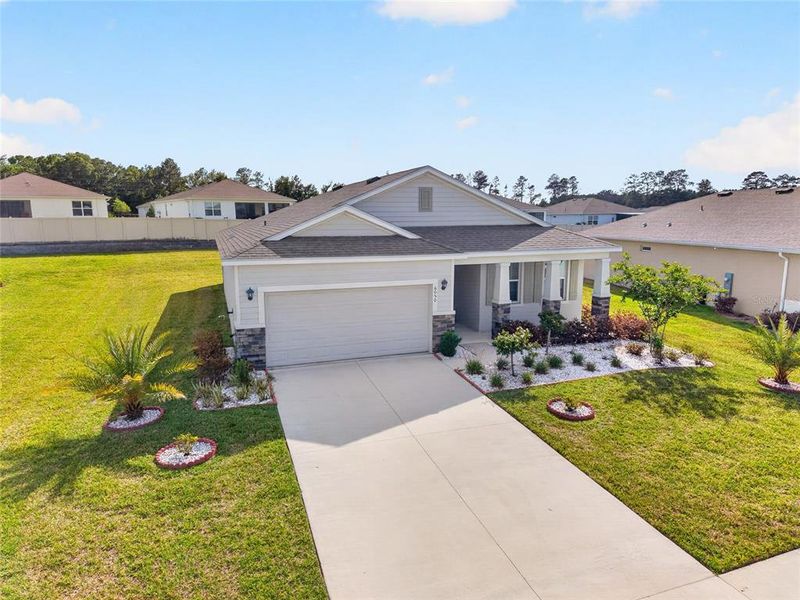 Front exterior of a new home in , Ocala, FL, highlighting curb appeal (Image 28).