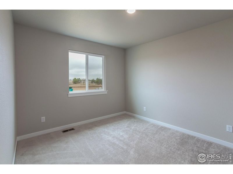 Spacious, unfurnished interior of a new home in Promontory Point, Greeley (Image 25).