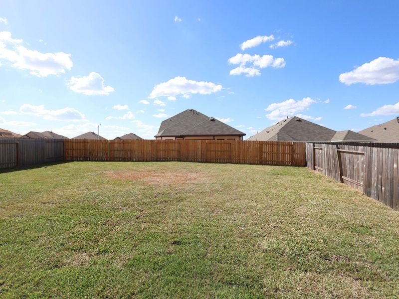 Exterior details and patio area of a home in Magnolia Ridge, Magnolia (Image 4). Exterior details and patio area of a home in Magnolia Ridge, Magnolia (Image 4).