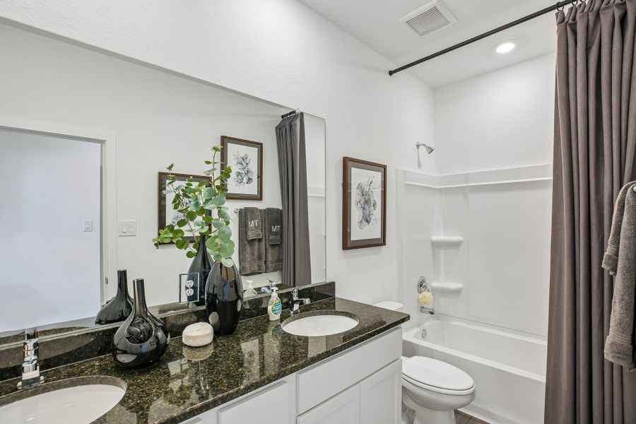 Representative furnished interior of a home built from the Charlton by Taylor Morrison in Mason Woods, Cypress (Image 19).