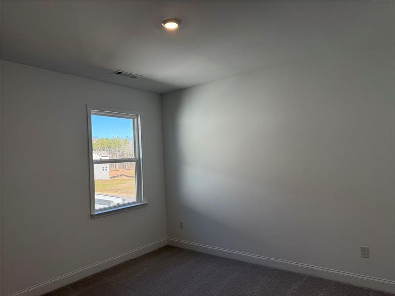 Spacious, unfurnished interior of a new home in Bennett Farm, Loganville (Image 24).