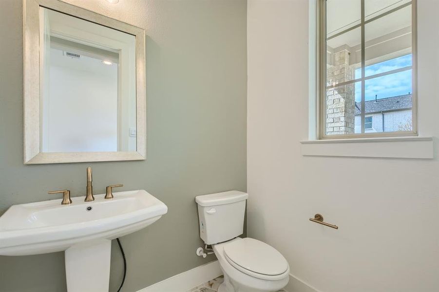 Bathroom with toilet and sink