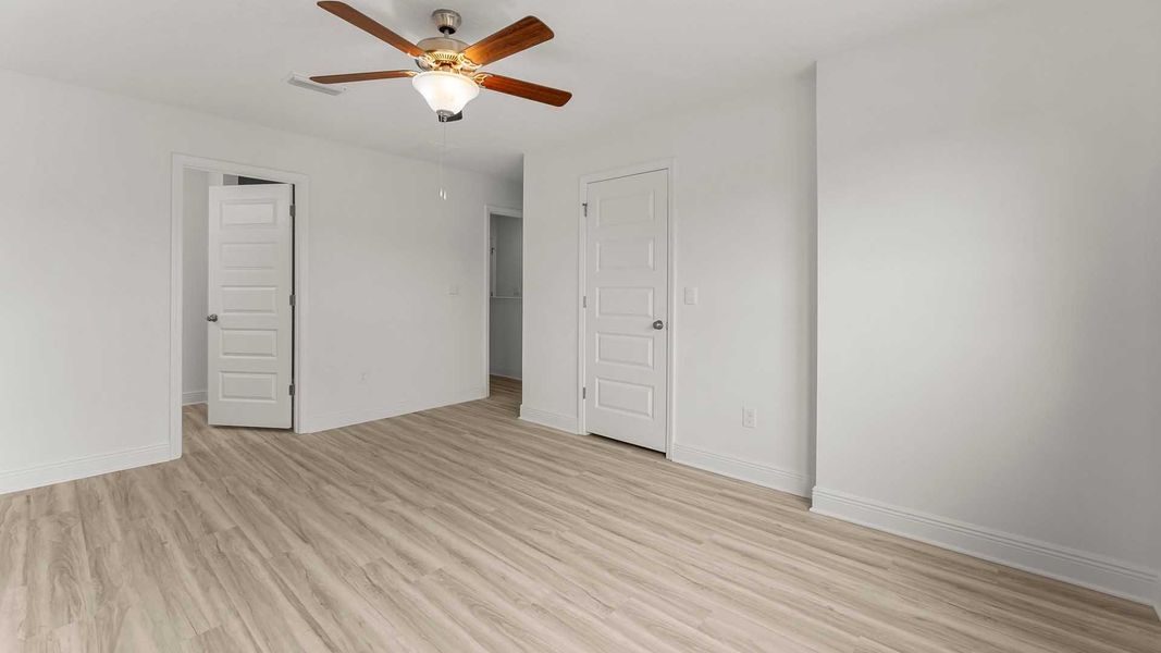 Spacious, unfurnished interior of a new home in Hawks Landing Townhomes, Santa Rosa Beach (Image 22). Spacious, unfurnished interior of a new home in Hawks Landing Townhomes, Santa Rosa Beach (Image 22).