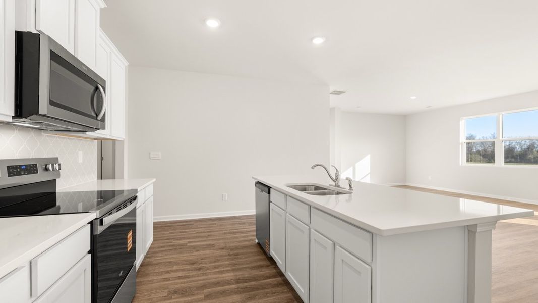 Furnished interior view inside a new home in The Preserve at Agricultural Village, Perry (Image 7).