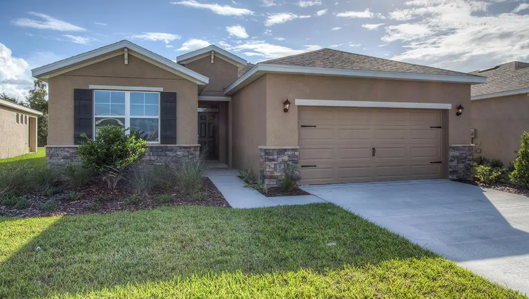 Representative exterior photo of a completed home built from the Avon by D.R. Horton in Mockingbird Reserve at Winding Oaks, Ocala, FL (Image 1). Representative exterior photo of a completed home built from the Avon by D.R. Horton in Mockingbird Reserve at Winding Oaks, Ocala, FL (Image 1).