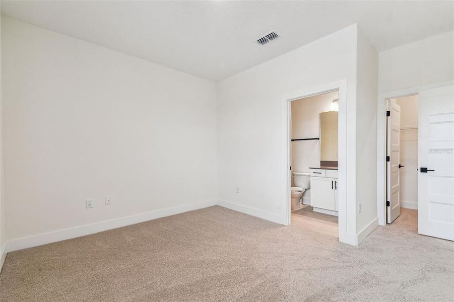 Spacious, unfurnished interior of a new home in Hidden Ridge, New Port Richey (Image 66).