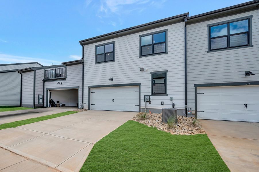 Exterior details and patio area of a home in Seven Oaks, Belmont (Image 3).