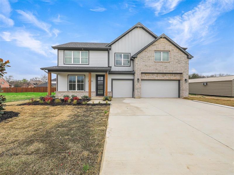 Front exterior of a new home in , Sherman, TX, highlighting curb appeal (Image 24).