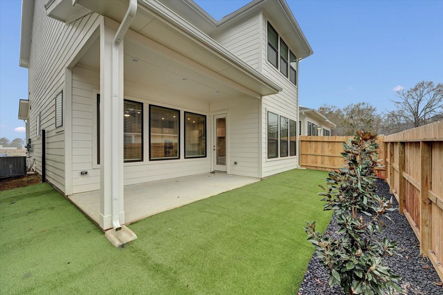 Exterior details and patio area of a home in Summer Place  35', Montgomery (Image 4).