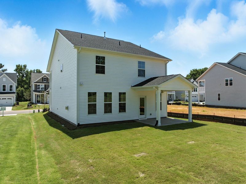 Front exterior of a new home in Six Oaks, Summerville, SC, highlighting curb appeal (Image 29).