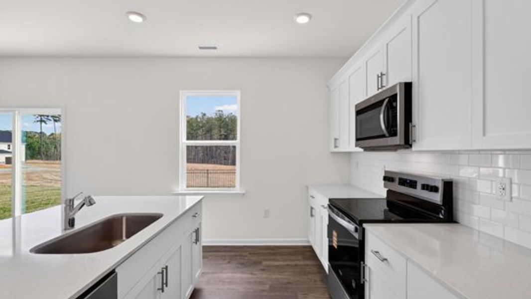 Furnished interior view inside a new home in Shahbain Reserve, Raeford (Image 5).