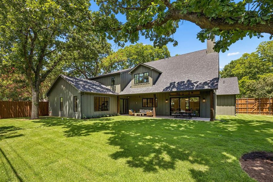 Backyard is massive, with two oak trees offering plenty of shade. Backyard is massive, with two oak trees offering plenty of shade.