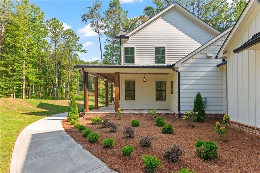 Exterior details and patio area of a home in , Ball Ground (Image 36).
