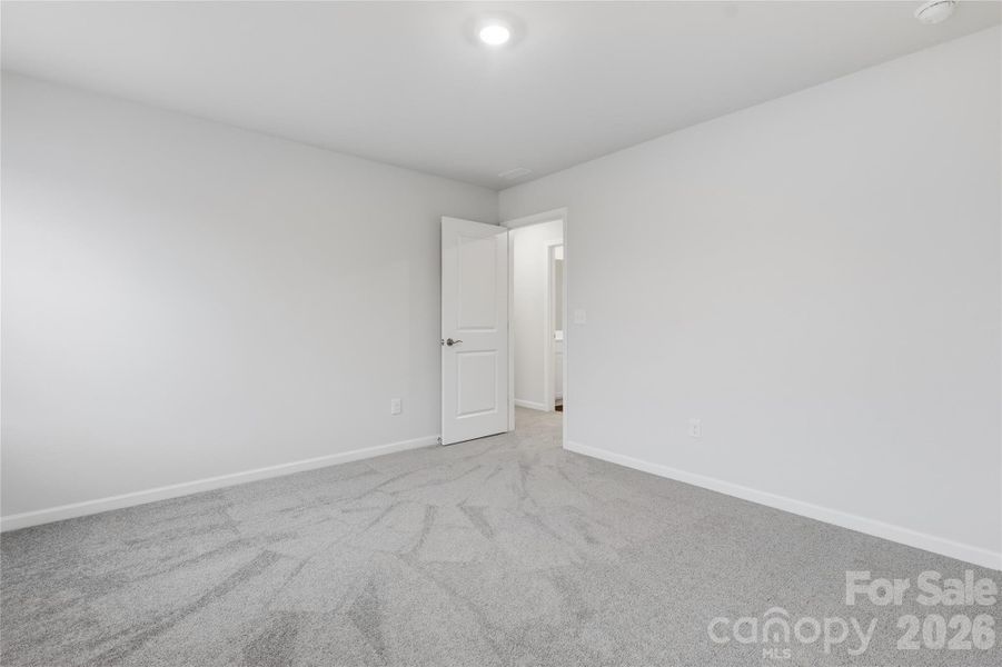 Spacious, unfurnished interior of a new home in Redhawk: Enclave, Belmont (Image 25).