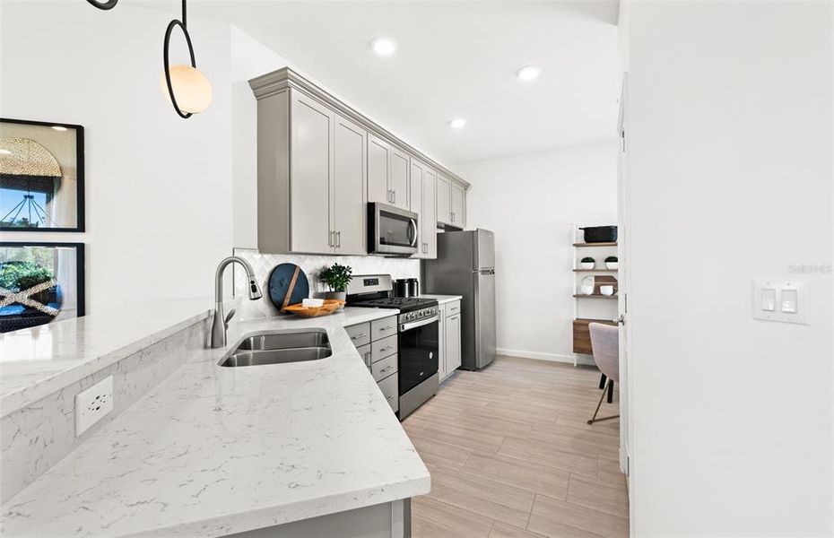 Furnished interior view inside a new home in BeachWalk by Manasota Key, Englewood (Image 21).