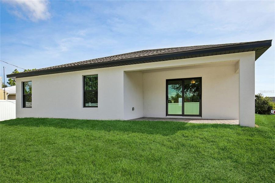 Exterior details and patio area of a home in , Port Charlotte (Image 25).