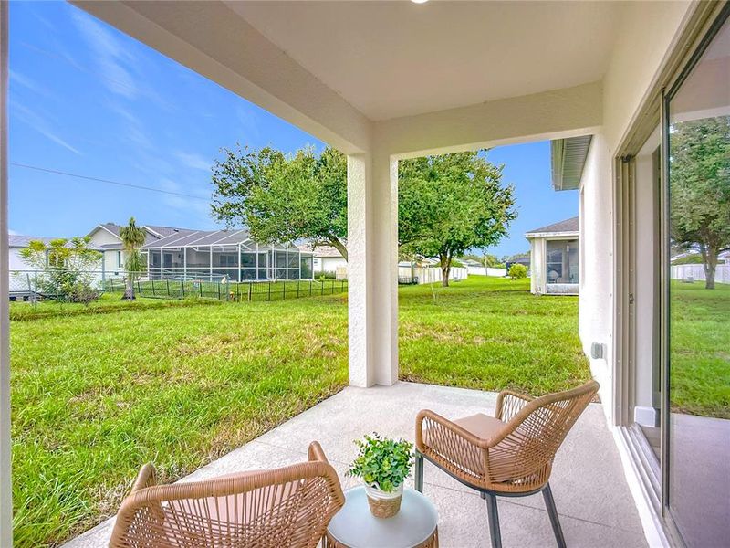Exterior details and patio area of a home in , North Port (Image 24).