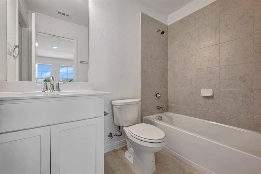 Furnished interior view inside a new home in Lilyana, Celina (Image 11).