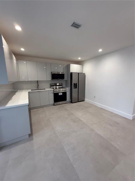 Spacious, unfurnished interior of a new home in , Miami (Image 13). Spacious, unfurnished interior of a new home in , Miami (Image 13).