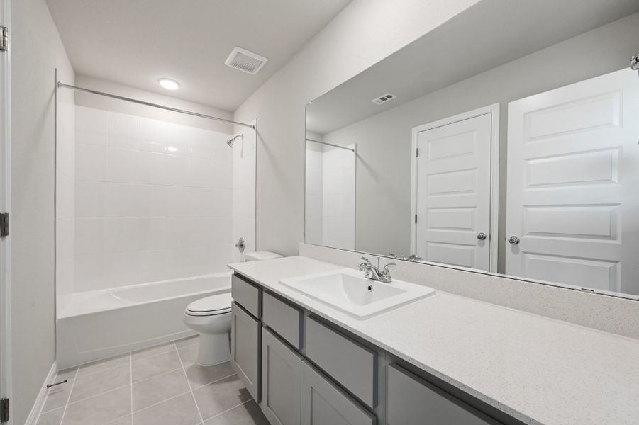 Bathroom in the Willow home plan by Trophy Signature Homes – REPRESENTATIVE PHOTO