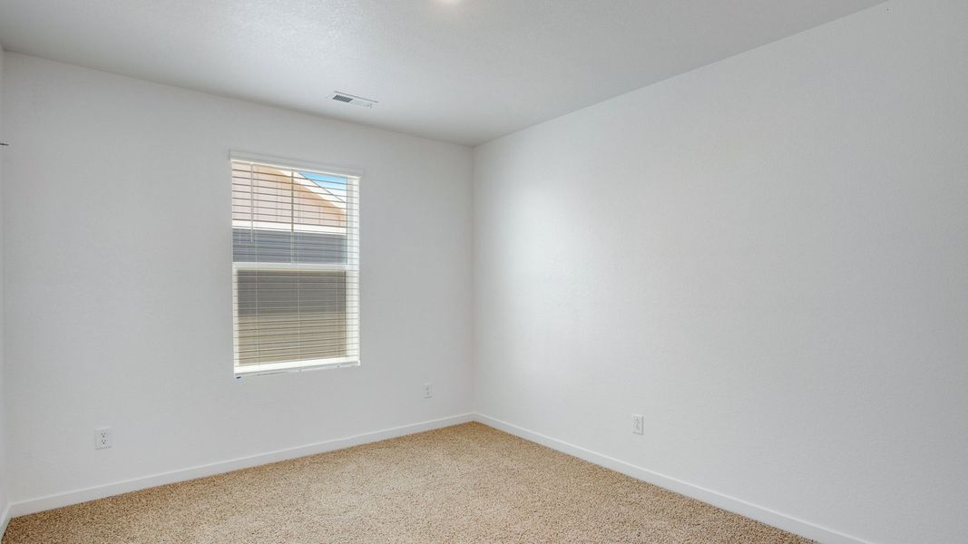 Spacious, unfurnished interior of a new home in Sky Ranch, Watkins (Image 16).