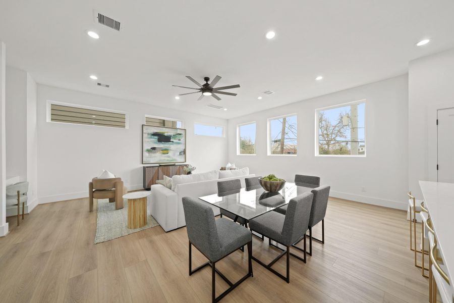 Ideal for casual dining to formal entertaining, this spacious dining area is centrally located between the family room and kitchen.