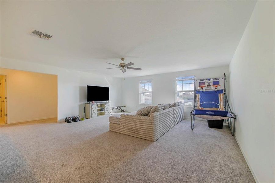 Furnished interior view inside a new home in Wind Meadows South, Bartow (Image 32).