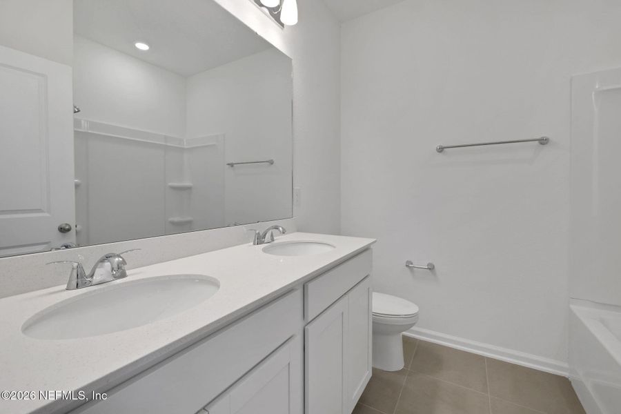 Furnished interior view inside a new home in Brook Forest, St. Augustine (Image 11).