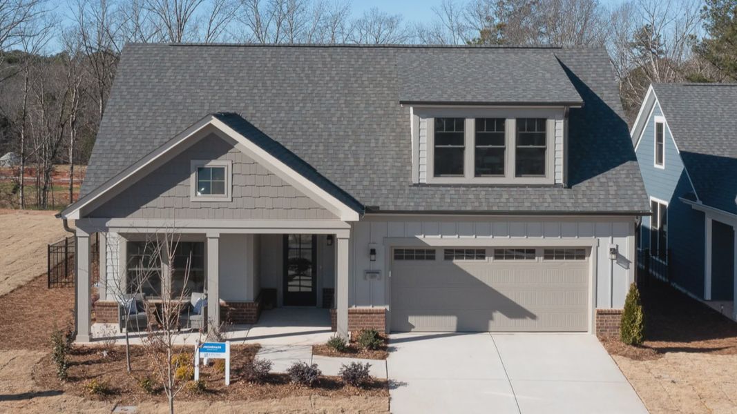 Representative exterior photo of a completed home built from the Promenade by Epcon Communities in The Courtyards at Oak Grove, Durham, NC (Image 31). Representative exterior photo of a completed home built from the Promenade by Epcon Communities in The Courtyards at Oak Grove, Durham, NC (Image 31).