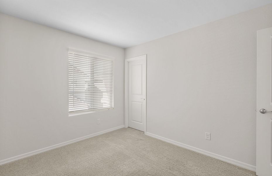 Spacious, unfurnished interior of a new home in Asante- Atrium Series, Surprise (Image 25).