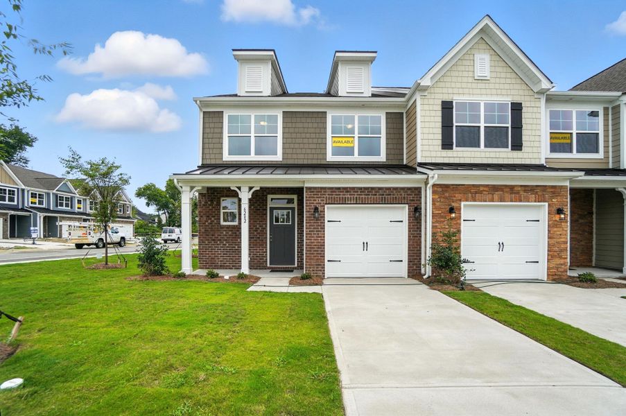 Front exterior of a new home in Harrisburg Village Townhomes, Harrisburg, NC, highlighting curb appeal (Image 25). Front exterior of a new home in Harrisburg Village Townhomes, Harrisburg, NC, highlighting curb appeal (Image 25).