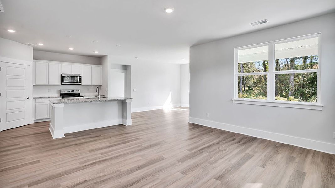 Representative unfurnished interior of a home built from the BRADFORD by D.R. Horton in Indigo Preserve, Leland (Image 29).