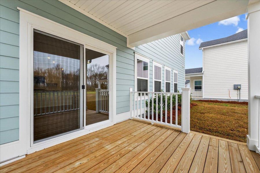 Exterior details and patio area of a home in The Coves at Lakes of Cane Bay, Summerville (Image 29).
